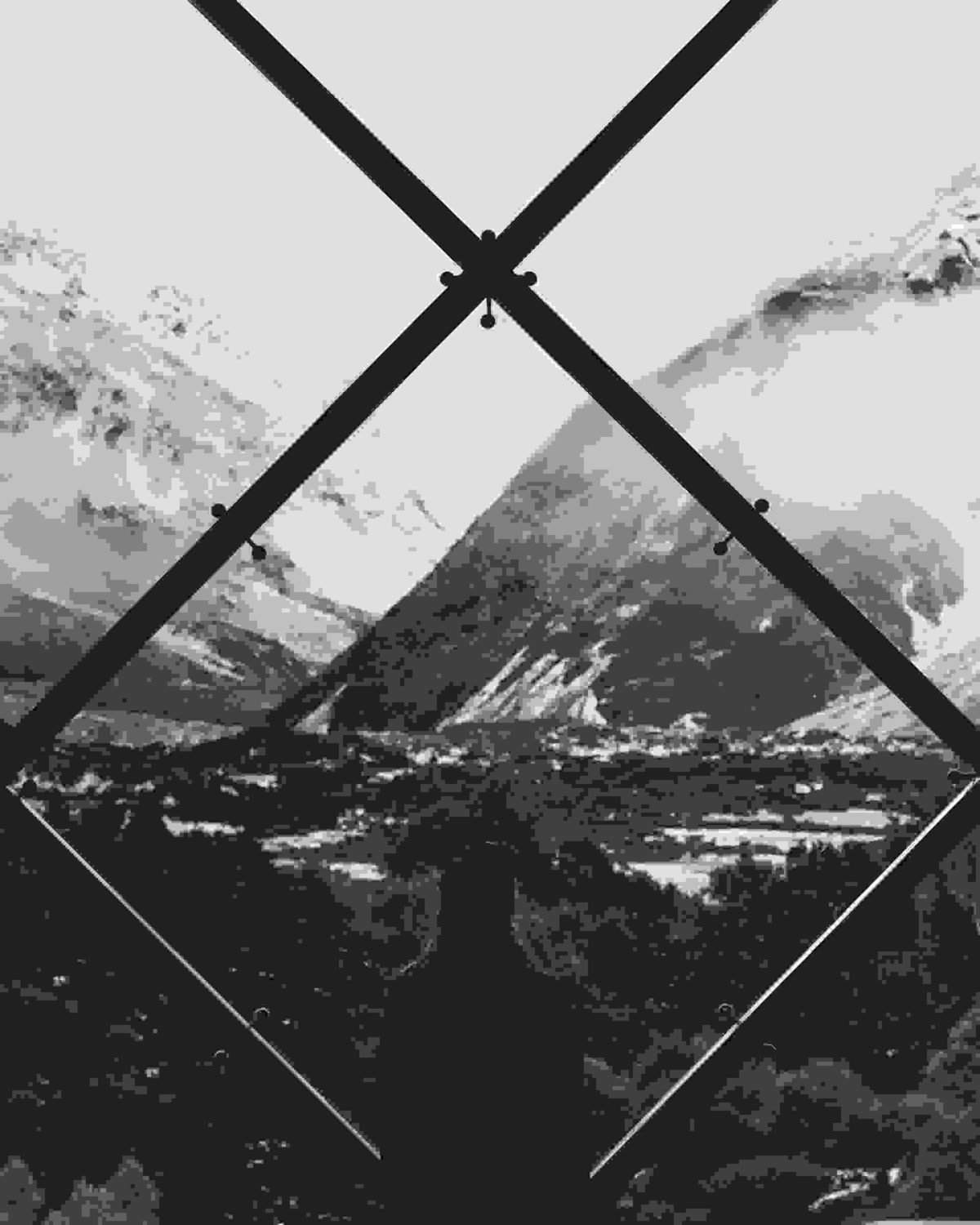 Overlooking mountains through huge glass window